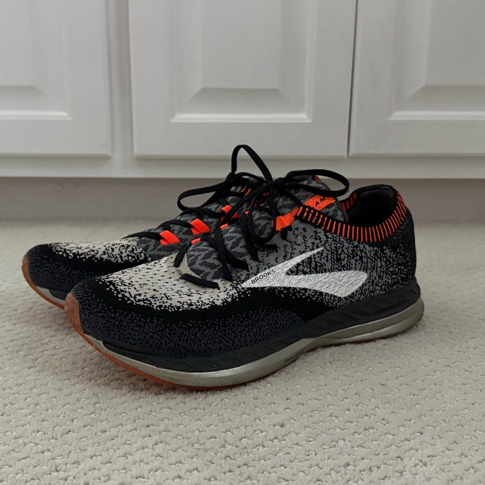 Brooks Bedlam size 12 Black and White Running Shoes with Orange Accents